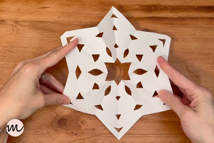 how to make a paper snowflake step 10 unfold