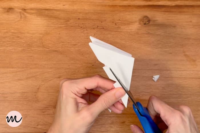 how to make a paper snowflake step 8 cut shapes